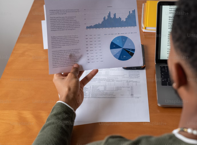  a man reading a report sheet